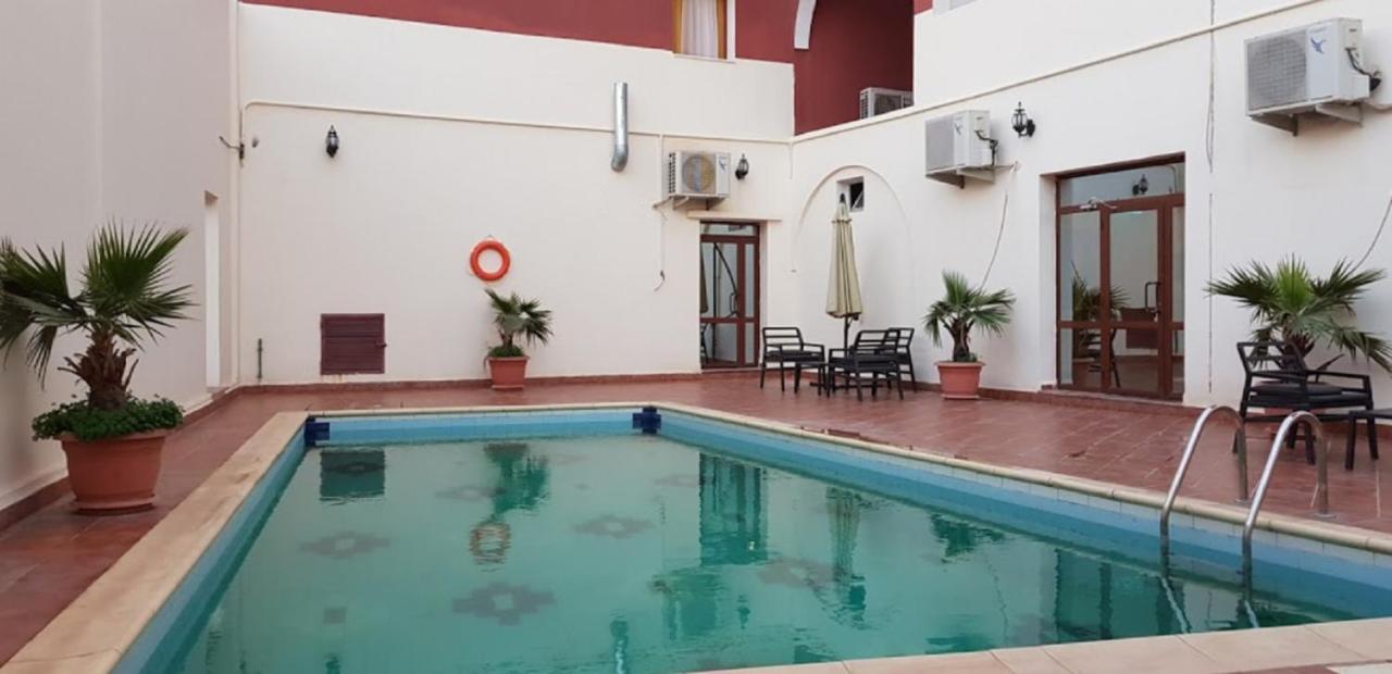 Hotel Takialt à Adrar Extérieur photo